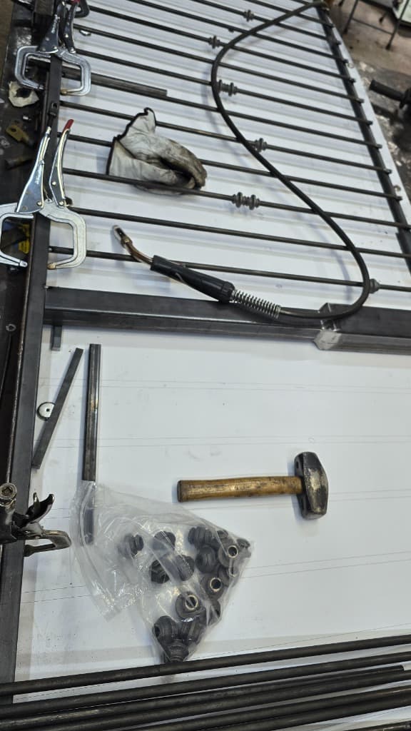 Step 3: Clamp scrollwork, bars, and weldments