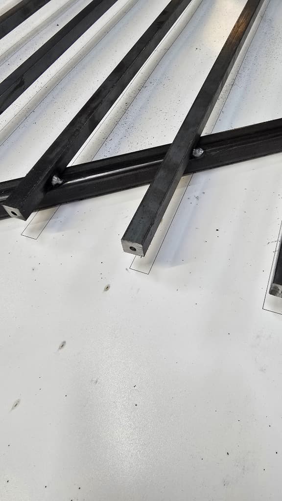 Step 2: Position square steel tubes and profile elements
